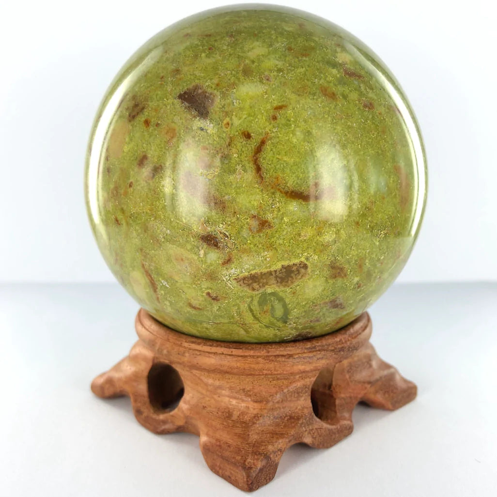 Carved Wooden Sphere Stands